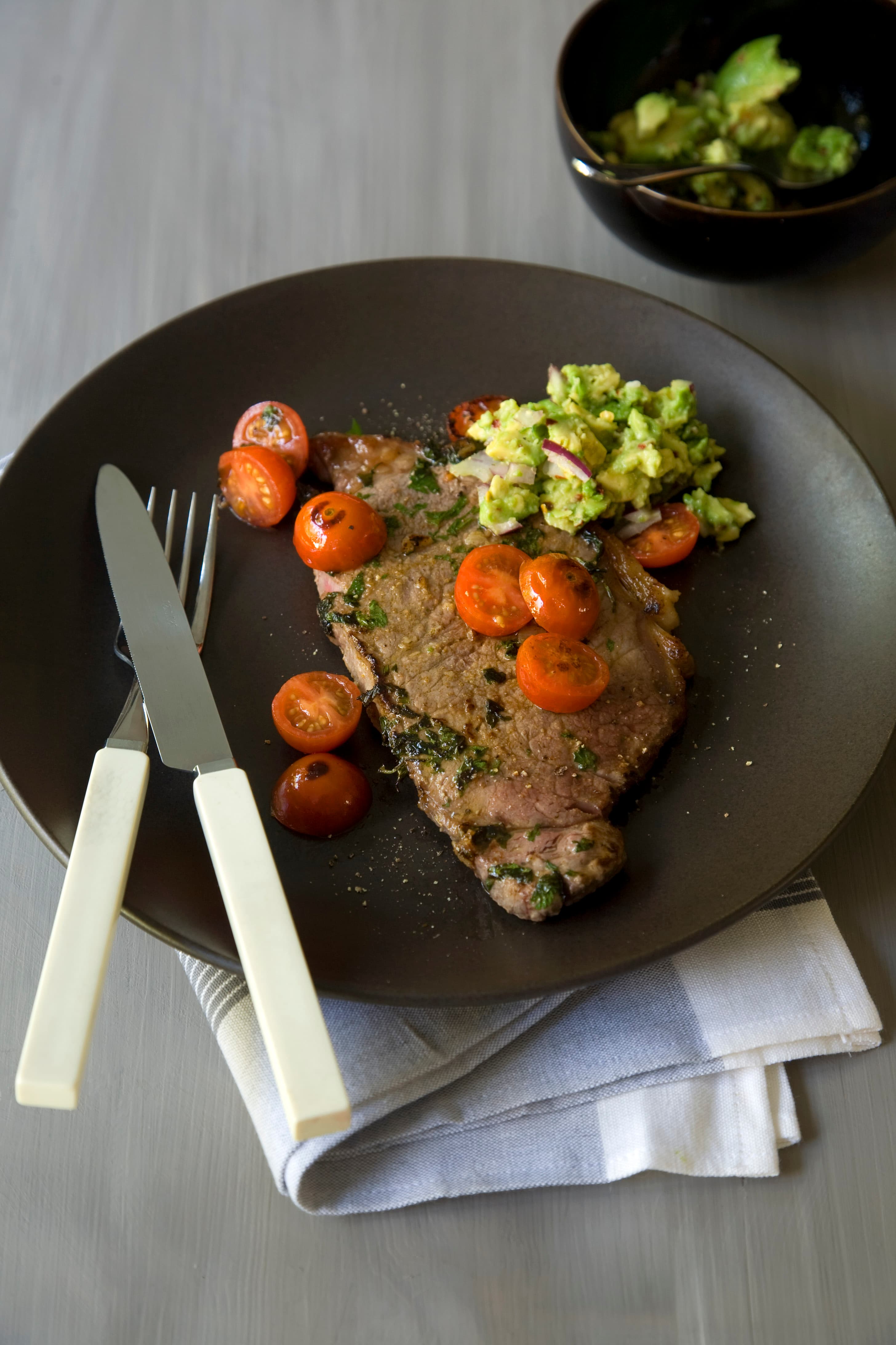 Steak with Guacamole and Blistered Tomatoes